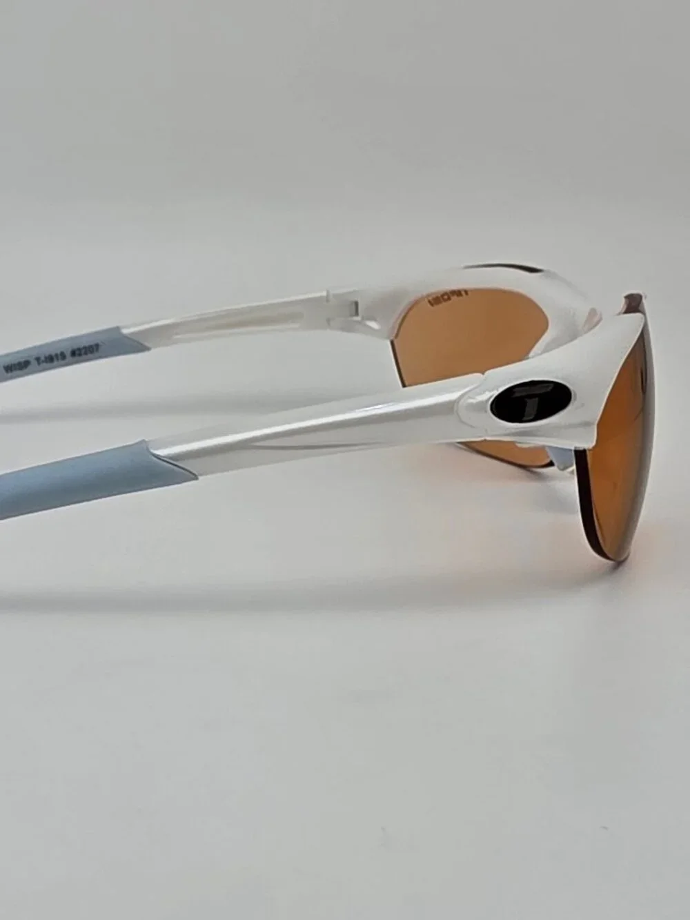 Tifosi Wisp Pearl White Baby Blue Frame Purple Mirror Lens Rimless Sunglasses